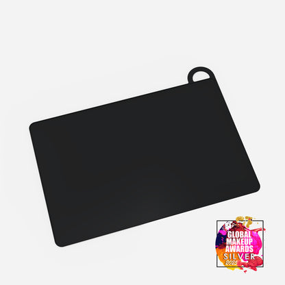 Black MY BIG MAKEUP MAT by MYKITCO, a versatile makeup tools mat with awards, designed for easy makeup application and blending.