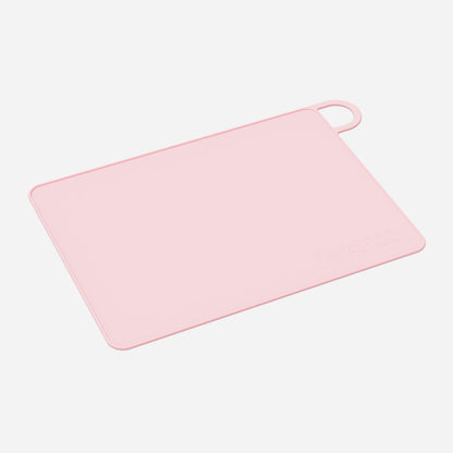 Pink MYKITCO small makeup mat, a versatile beauty tools accessory with a soft surface for makeup application.