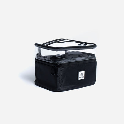 MYKITCO small canvas box bag with adjustable strap, featuring a compact, modern design and top zipper closure.